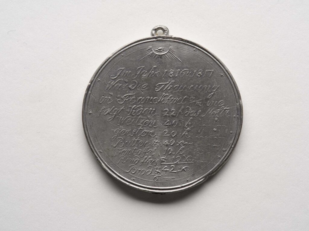 Münze mit Preisteuerungen